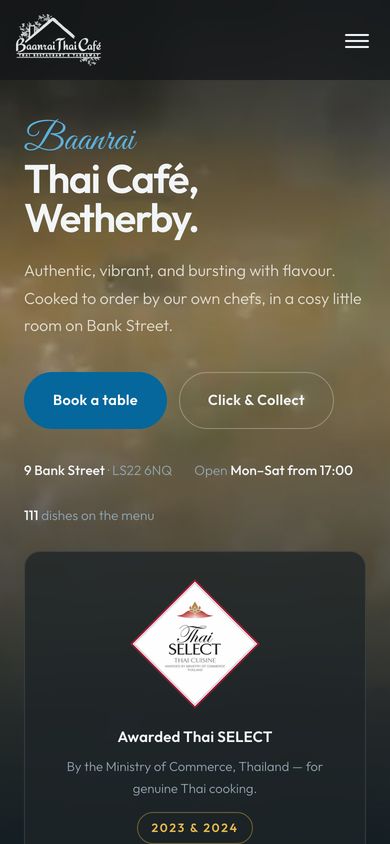 Baanrai Thai Café website on a phone